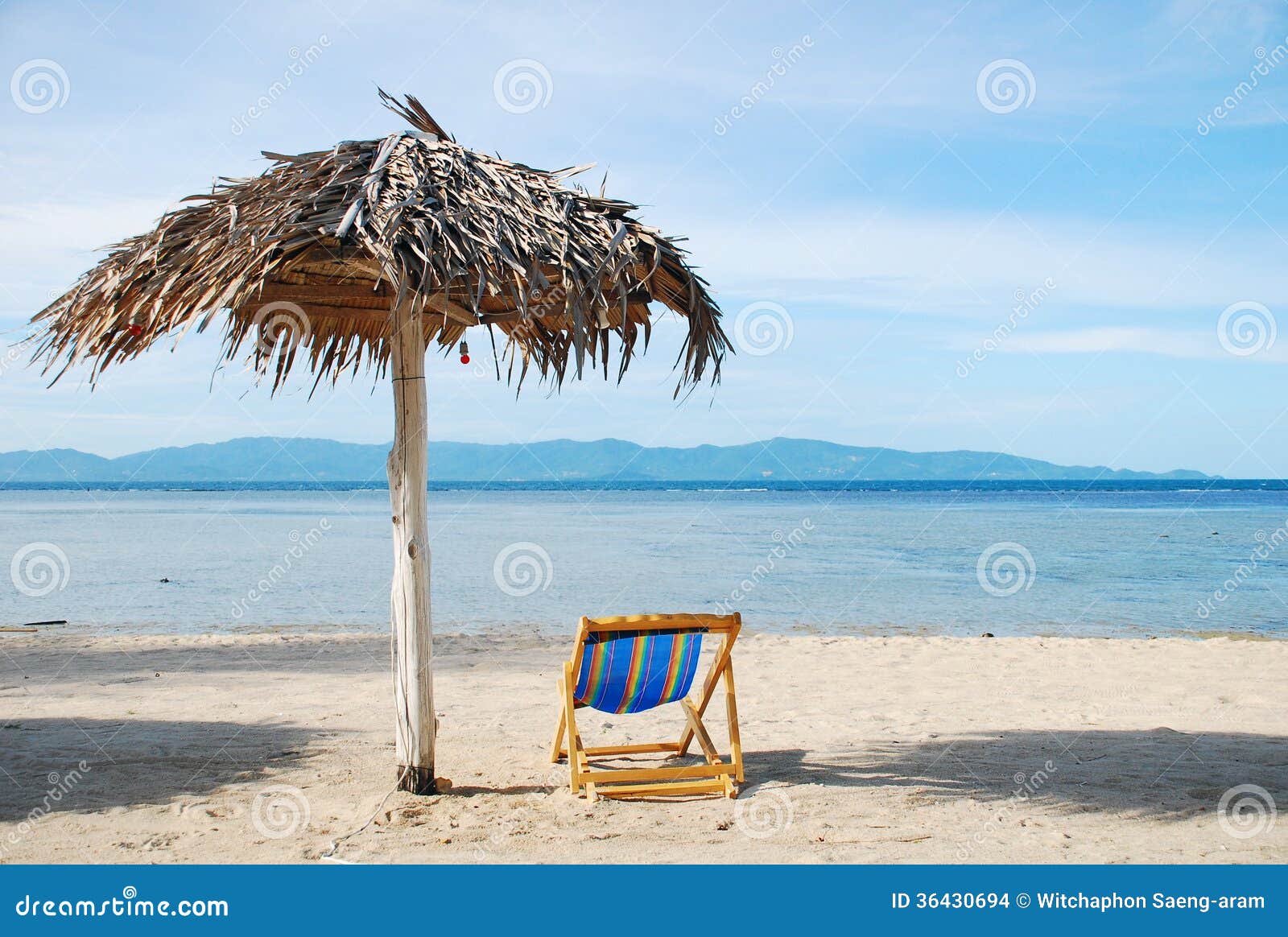 Beach Chair and Umbrella on White Sand Beach with Crystal Clear Stock ...
