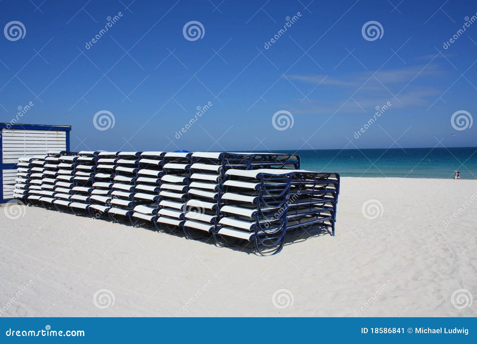 Stack of beach chairs on South Beach, Miami, Florida