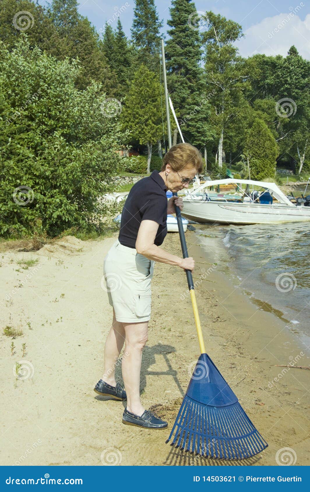 Beach cleaning stock image. Image of wrinkled, mature 14503621