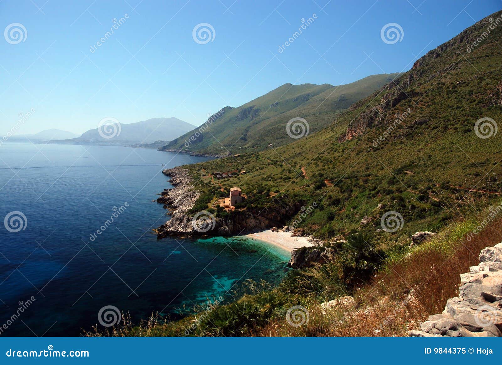 Beach with Clear Blue Sea and Rising Mountains Stock Image Image of