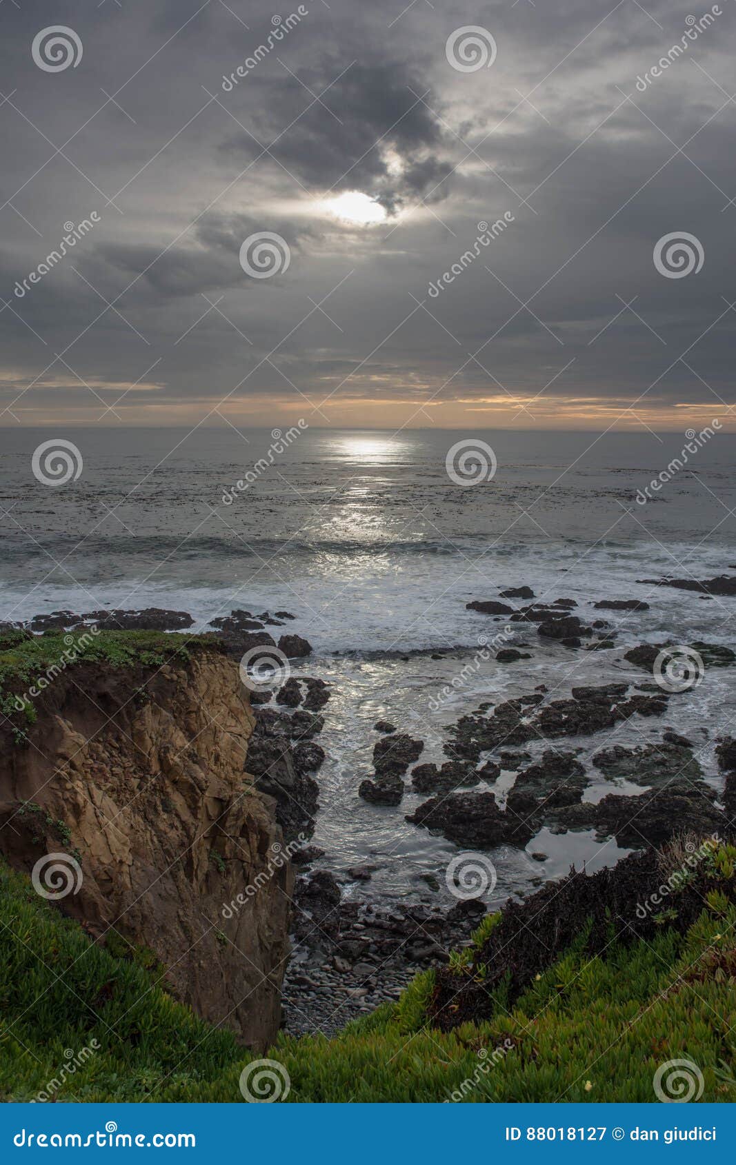 Beach Cliffs on the ocean. Beach Cliffs by the ocean with rocks foreground