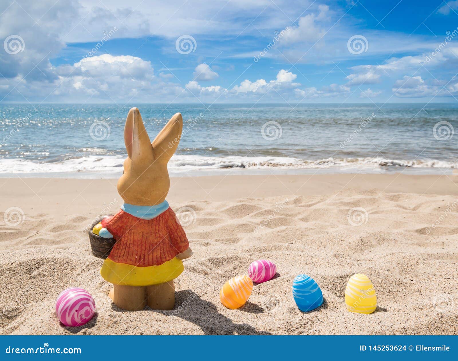 Beach Easter Background with Bunny and Color Eggs Stock Photo Image