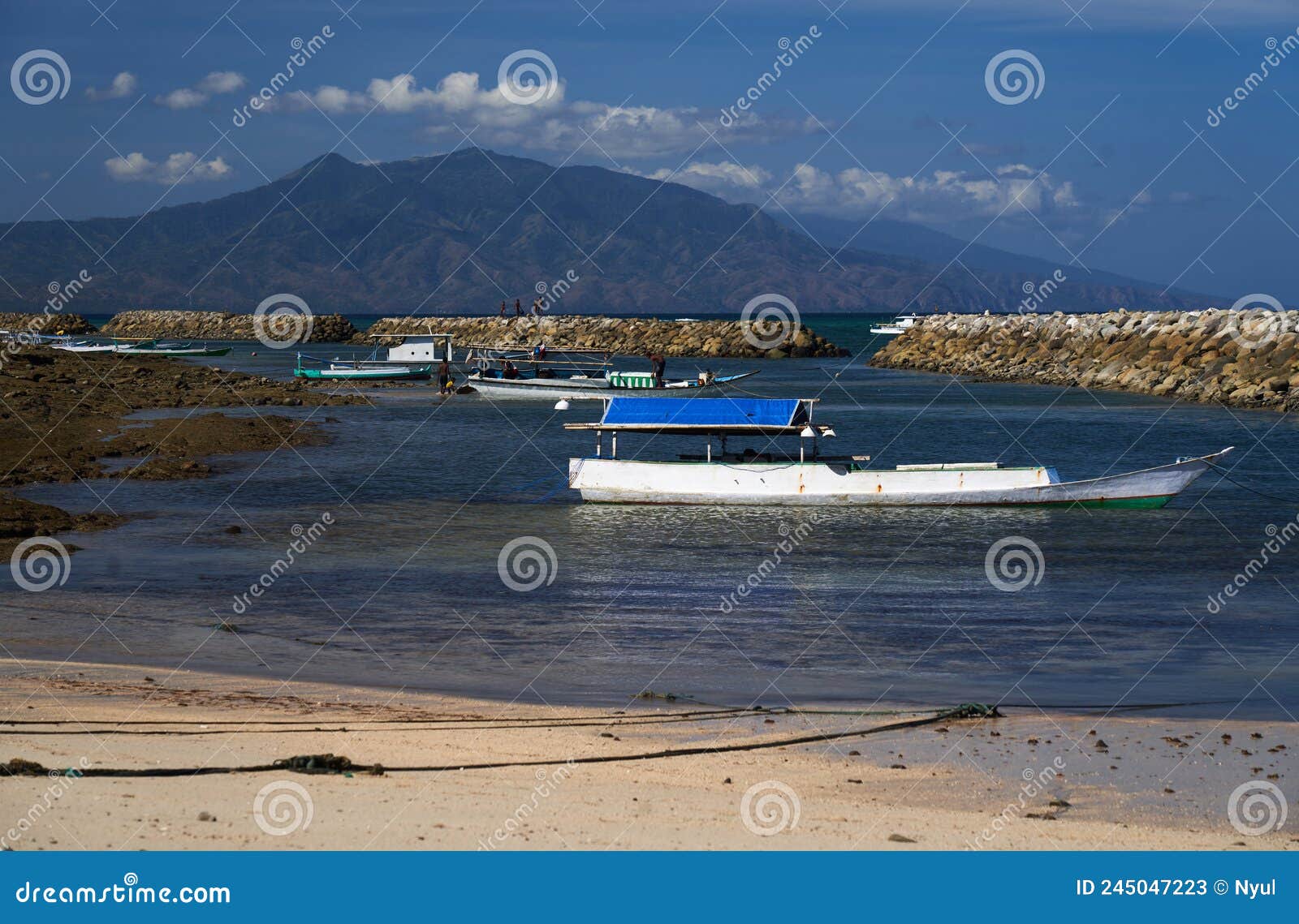 beach with fishing boat in asia.