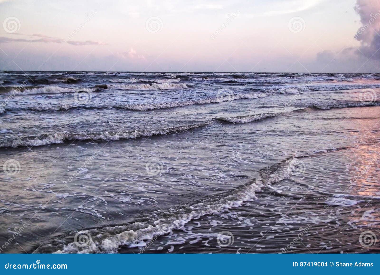 The Beach at Grand Isle, Louisiana Stock Photo Image of skies, tide