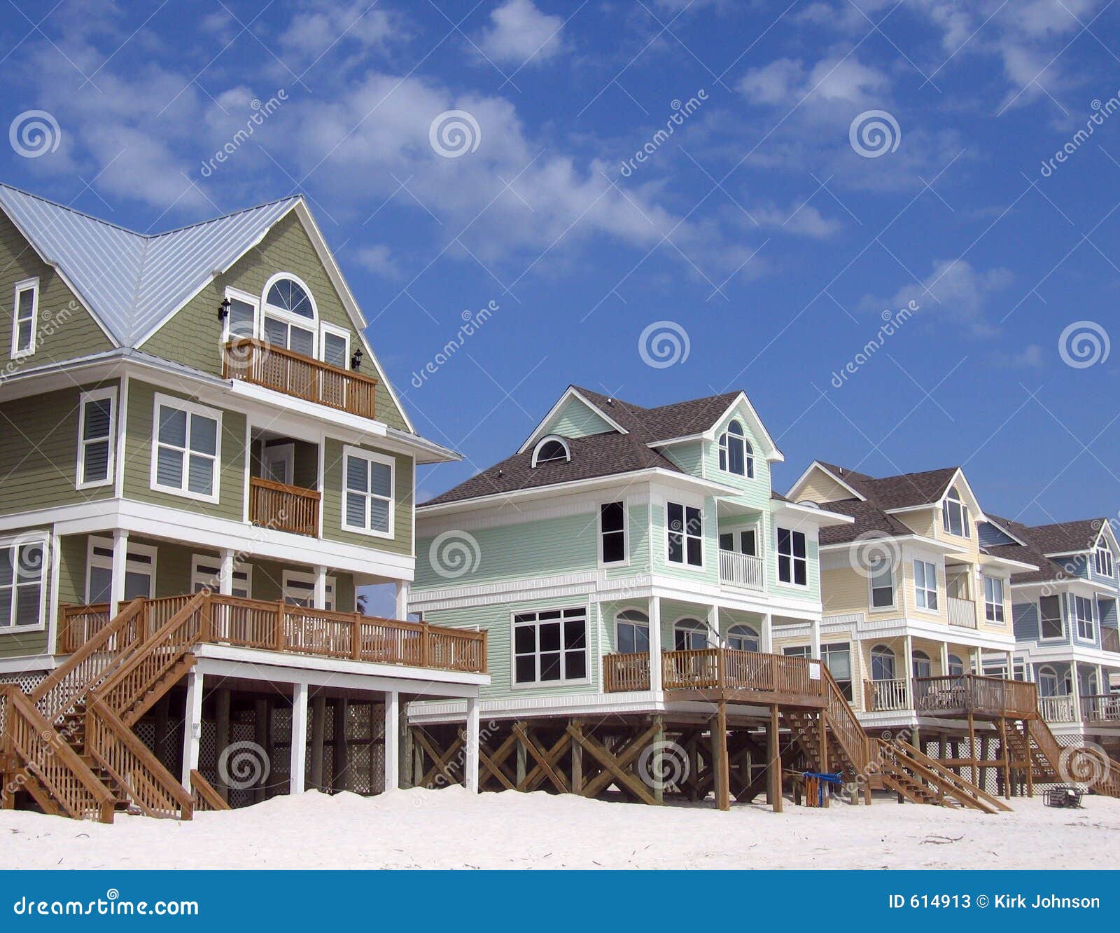 beach homes on blue sky background