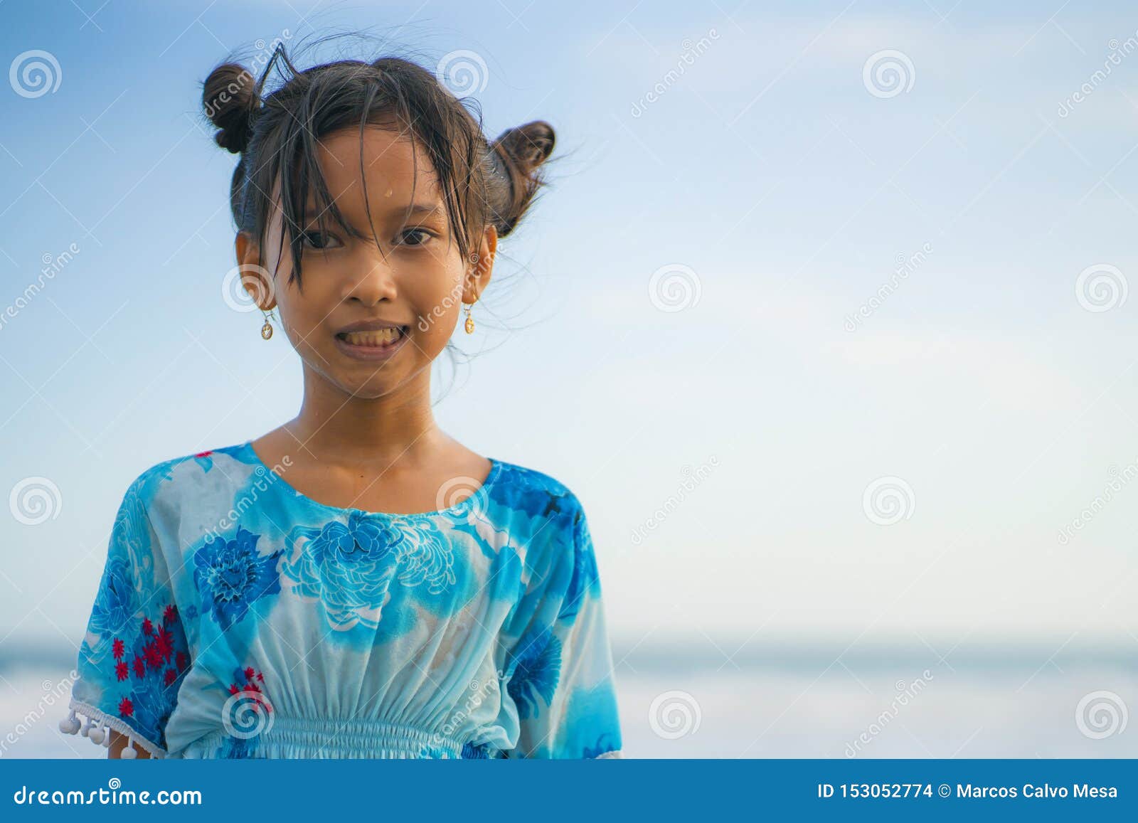Beach Lifestyle Portrait of Young Beautiful and Happy Asian Child Girl 8 or  9 Years Old with Cute Double Buns Hair Style Playing Stock Photo - Image of  lifestyle, holidays: 153052774