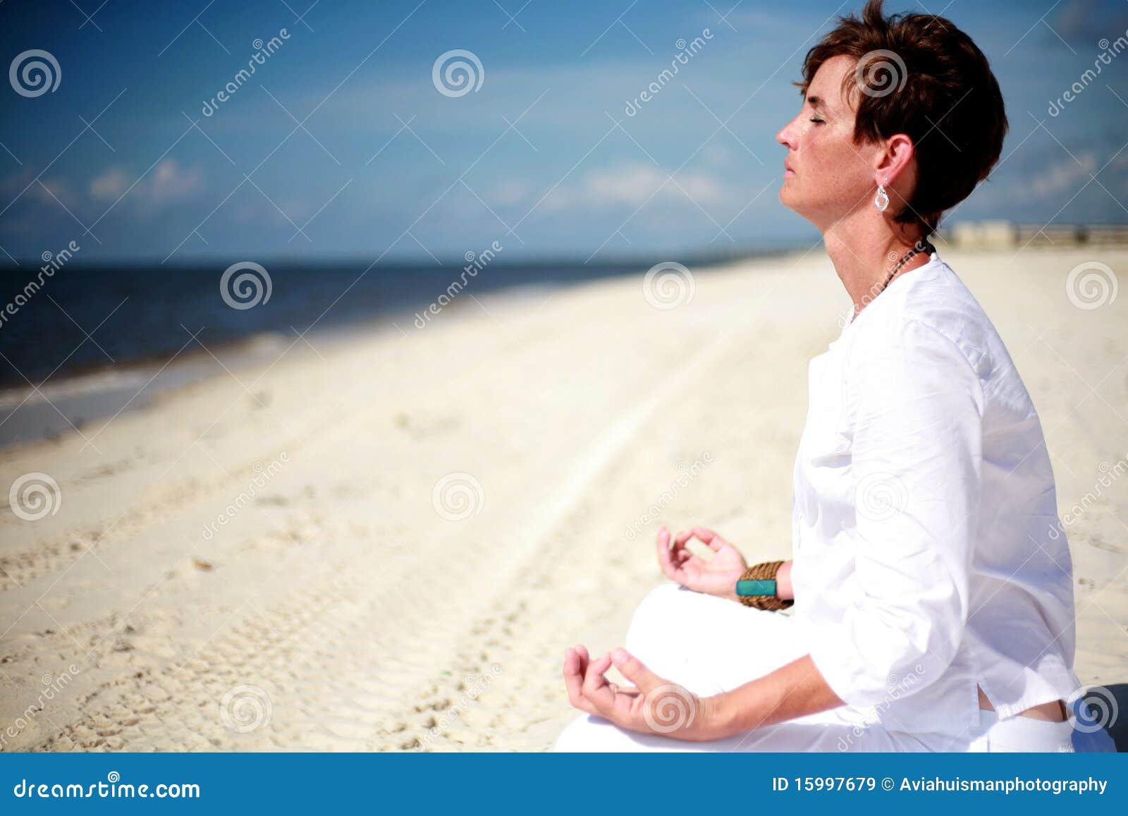 Beach Meditation stock image. Image of healthy, female 15997679