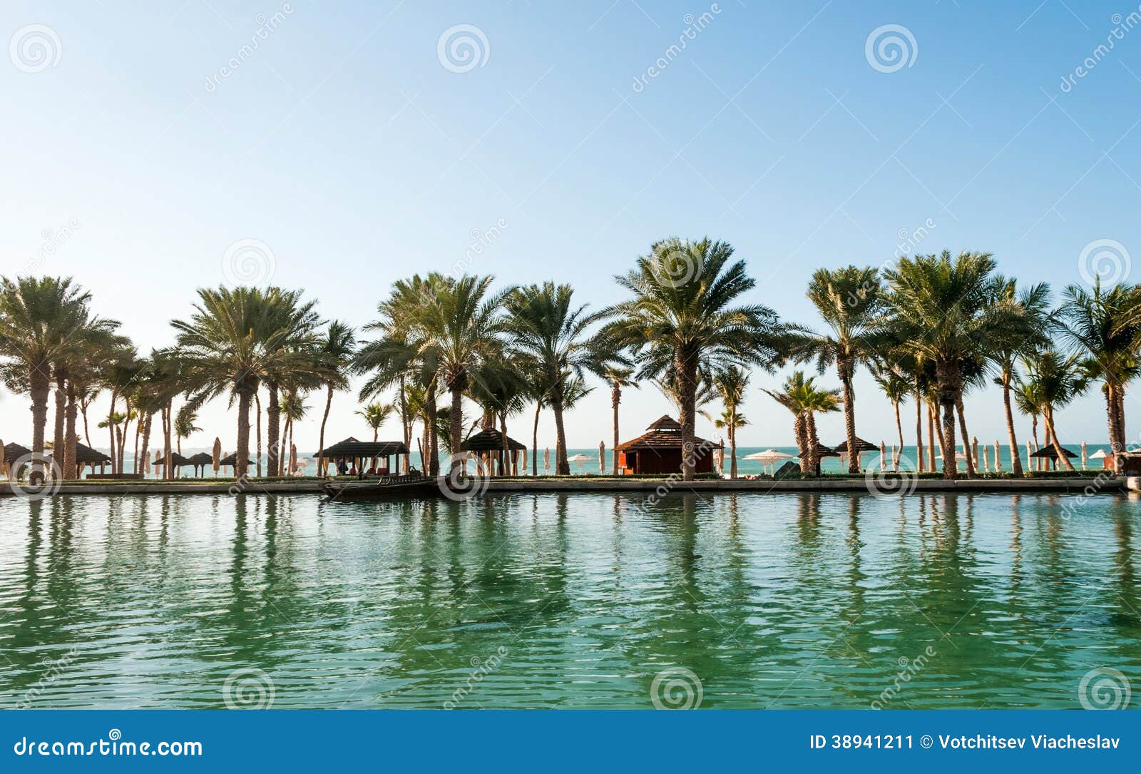 Beach with palms in Dubai stock image. Image of paradise 38941211