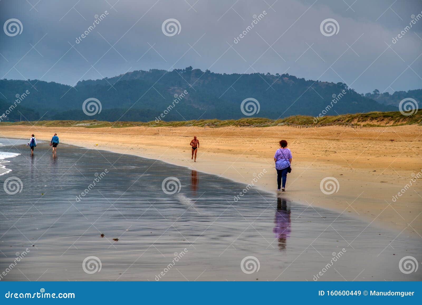 beach. people walking on the beach