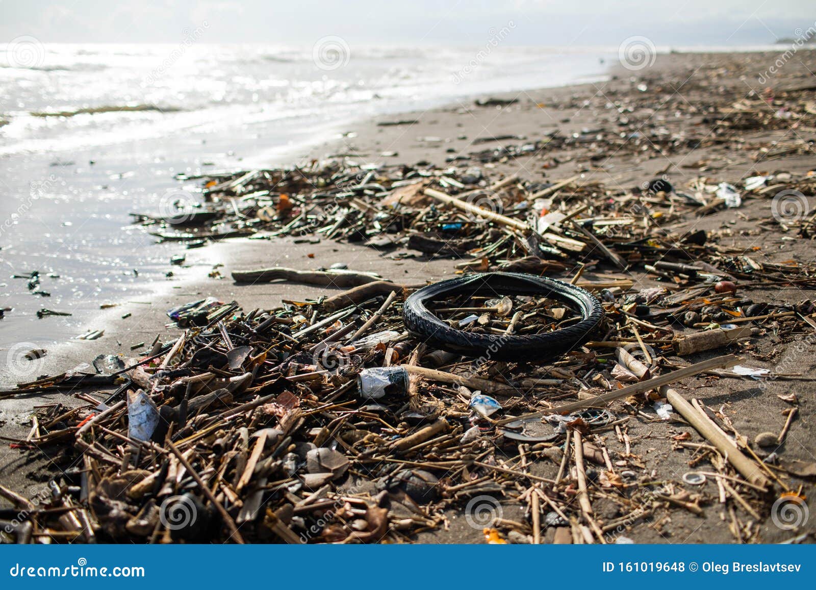 Beach Pollution with Plastic Bottles, Rubber Tyre Stock Photo - Image ...