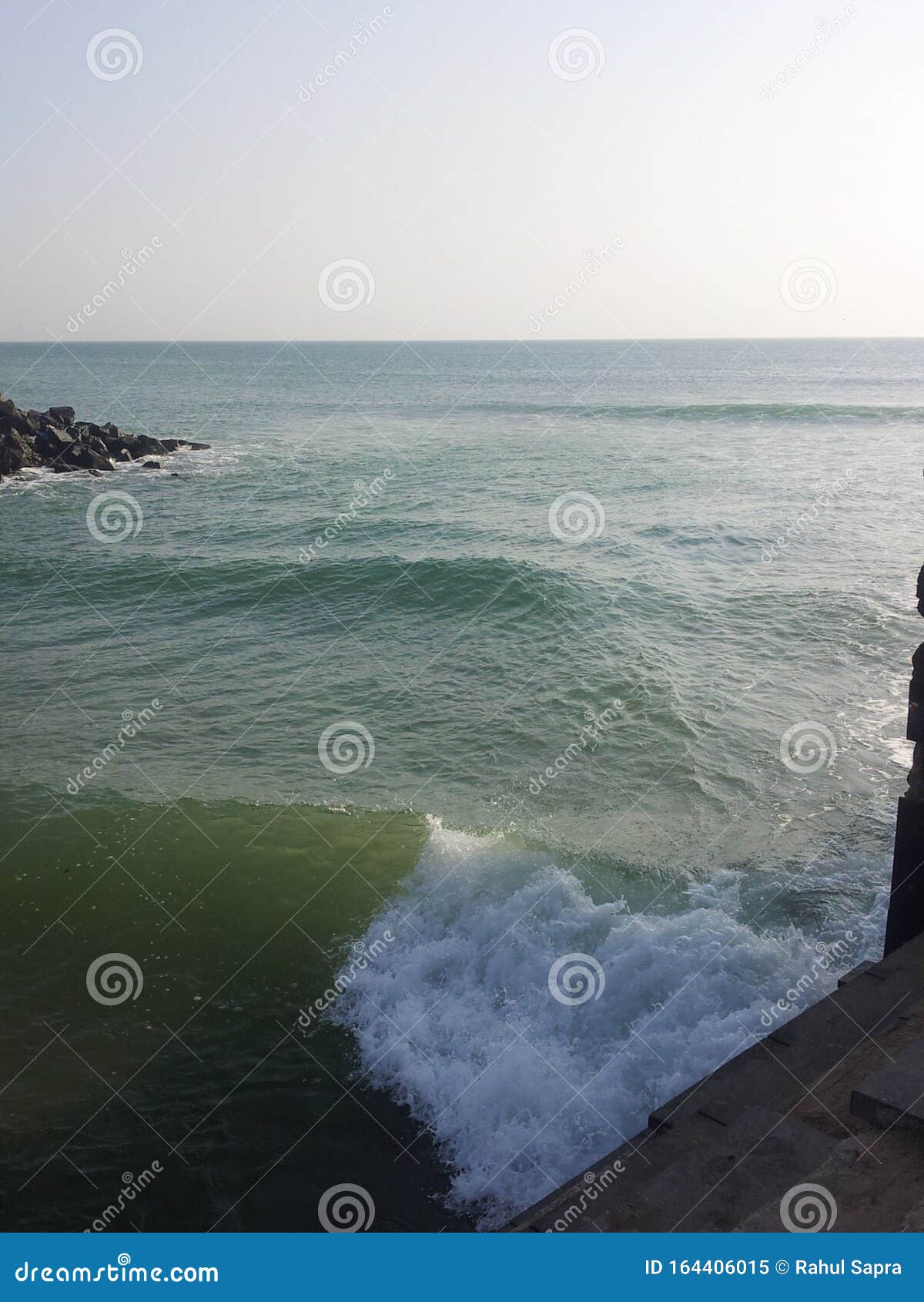 beach side view in gujarat india, beach in india, tides touching the beach