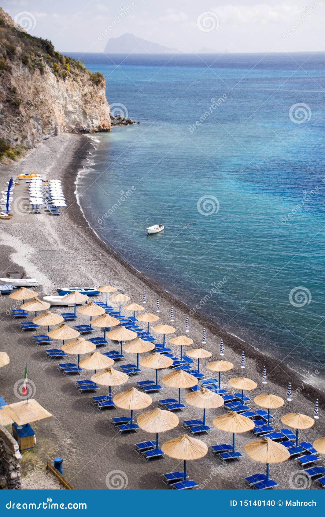 beach with sunshade umbrellas