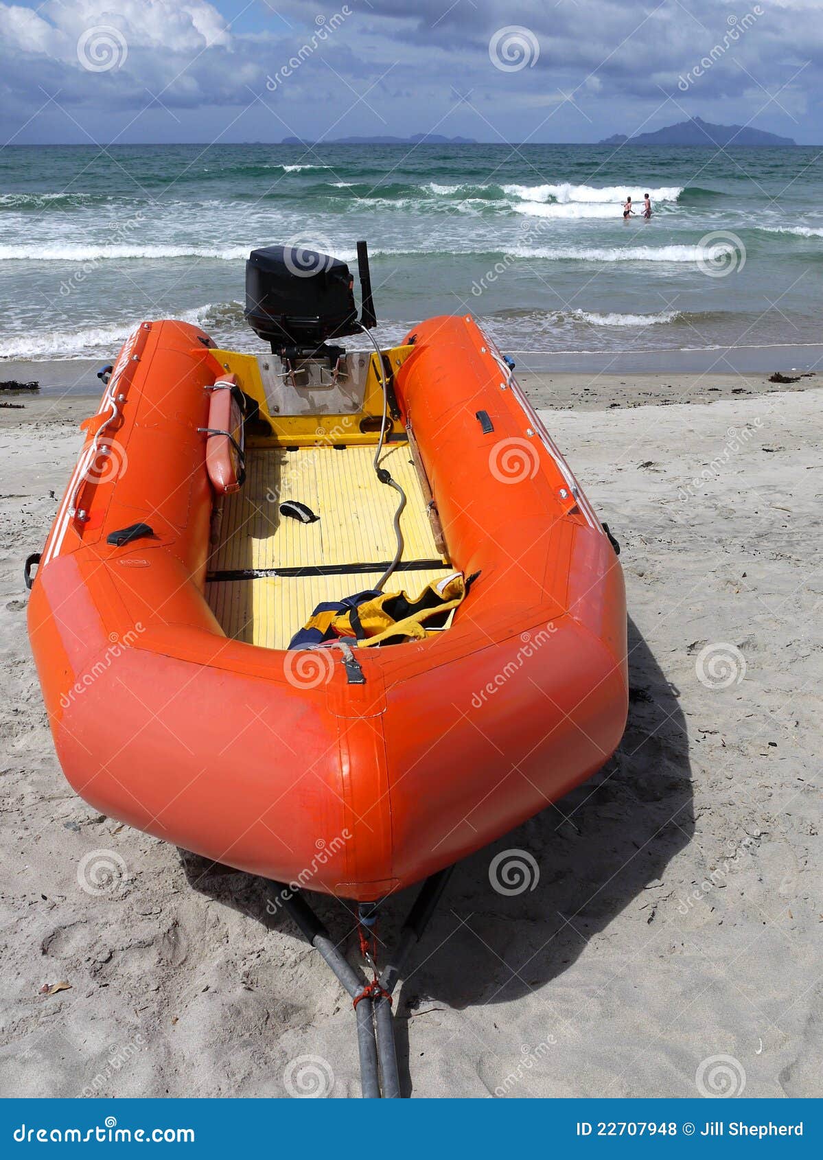 Beach: Surf Life-saving Inflatable and Swimmers Stock Photo - Image of ...