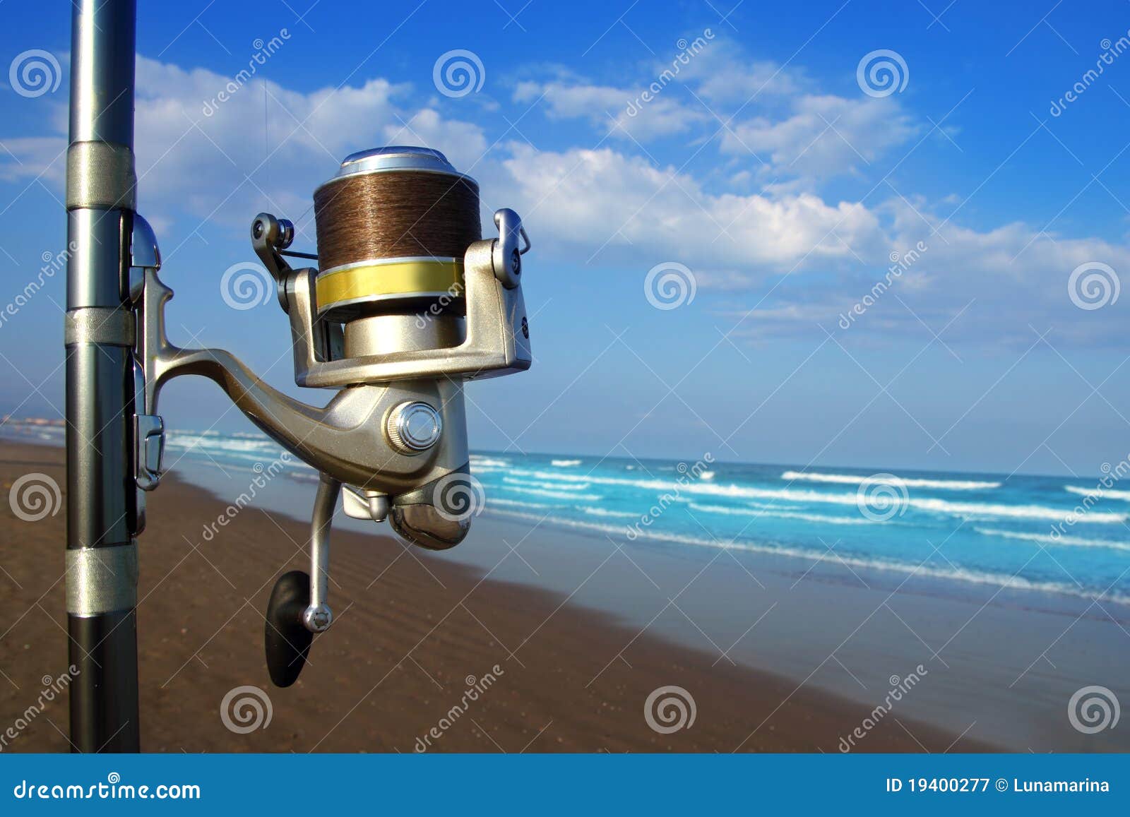 Beach Surfcasting Spinning Fishing Reel and Rod Stock Image
