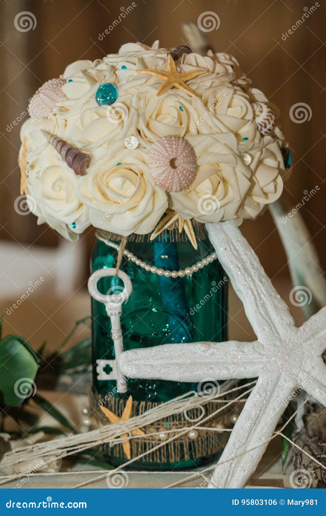 Beach Themed Ocean Wedding Reception Centerpiece With Floral