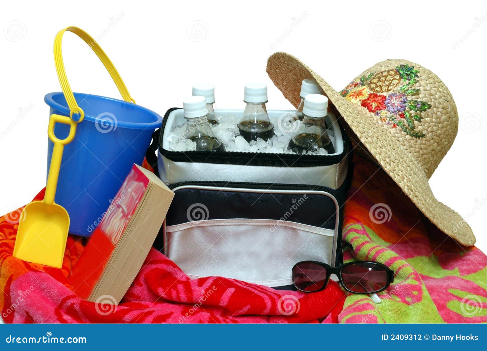 Beach Towel, Cooler, and Sand Pail Stock Photo - Image of paperback ...