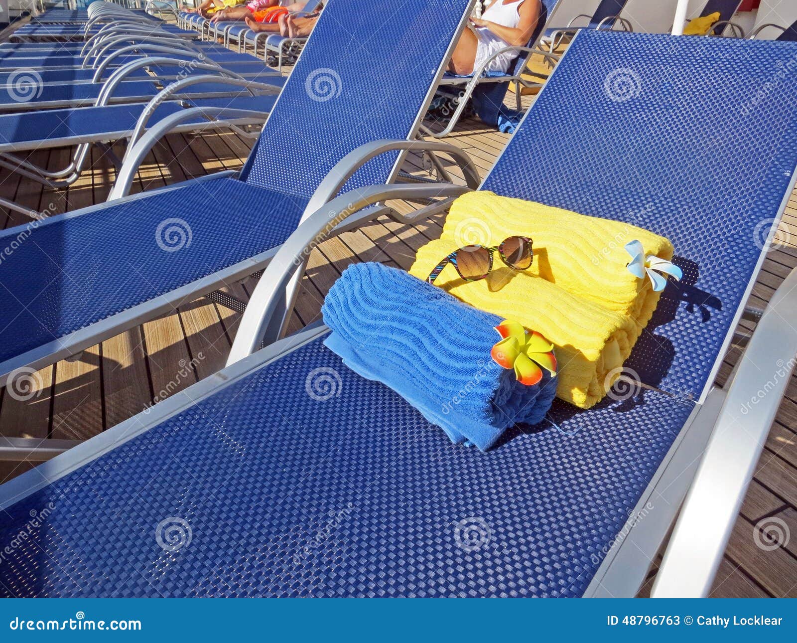 Beach Towels on a Deck Chair Stock Image Image of deckchair