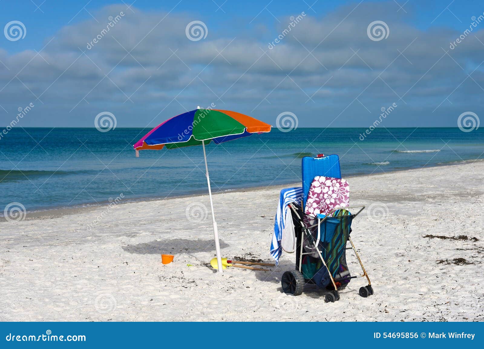 Beach Umbrella and Cart stock photo. Image of colorful 54695856