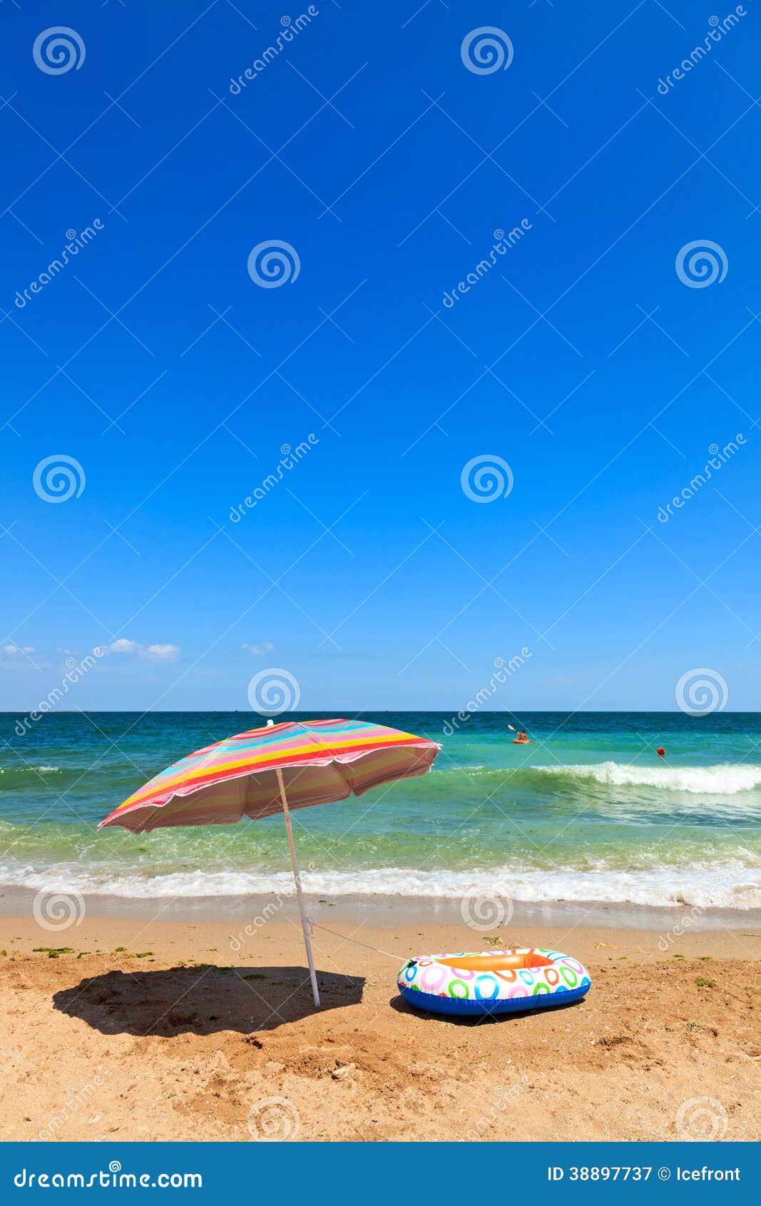 Beach Umbrella and Toy Boat at Sea Stock Image - Image of summer, wave ...