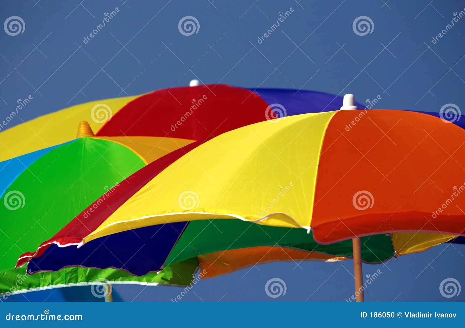 Beach umbrellas stock photo. Image of orange, umbrella - 186050