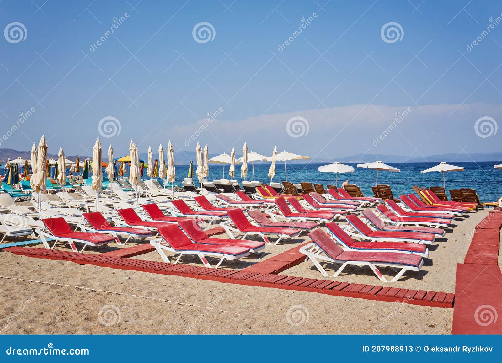 The Beach with Sun Beds, Which are Empty Stock Image Image of blue