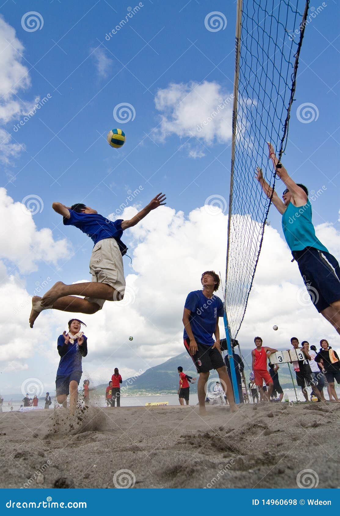 Beach volleyball spike editorial stock photo. Image of score 14960698