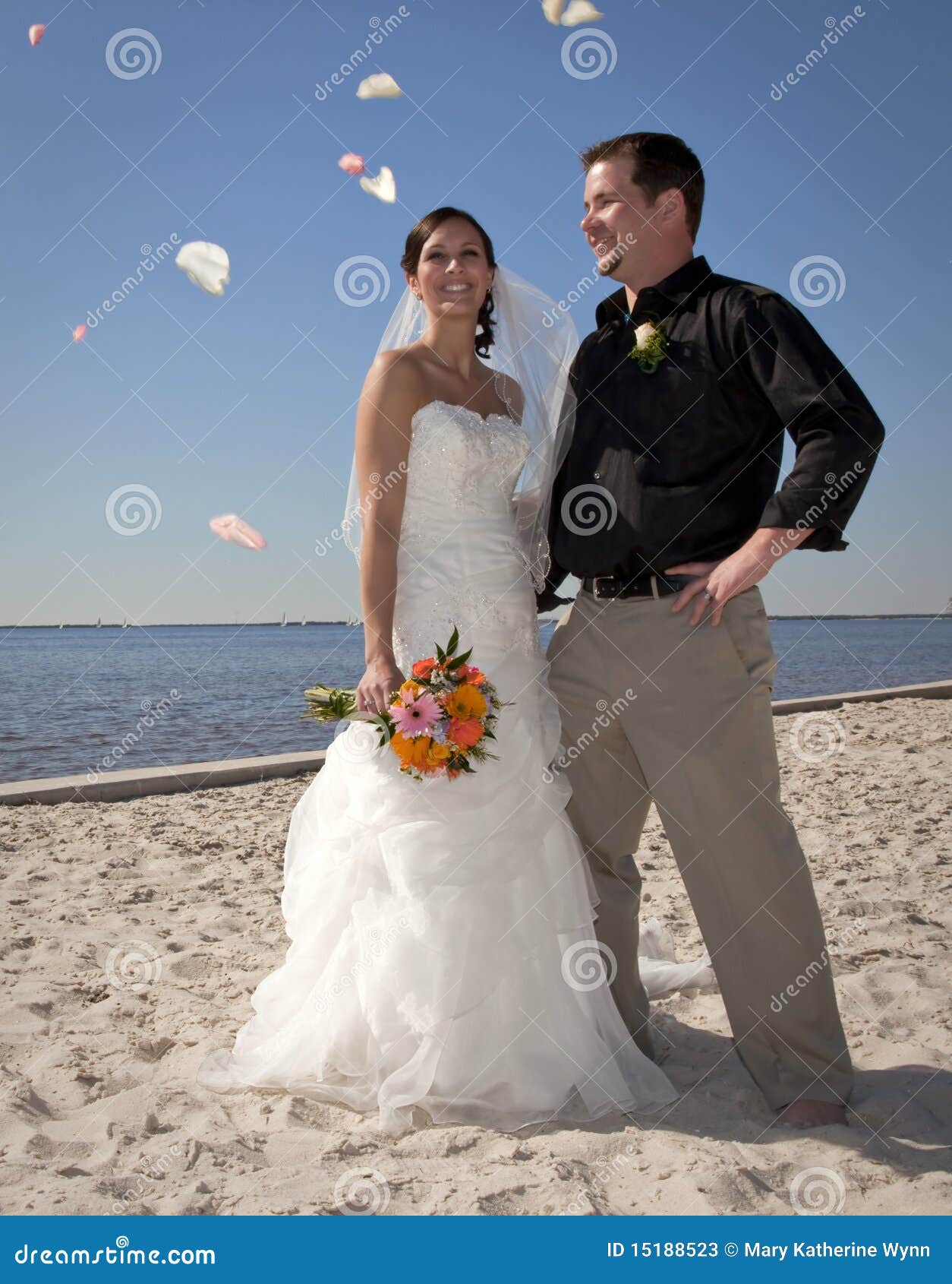 Beach Wedding Throwing Flowers Stock Image Image of groom, couple 15188523