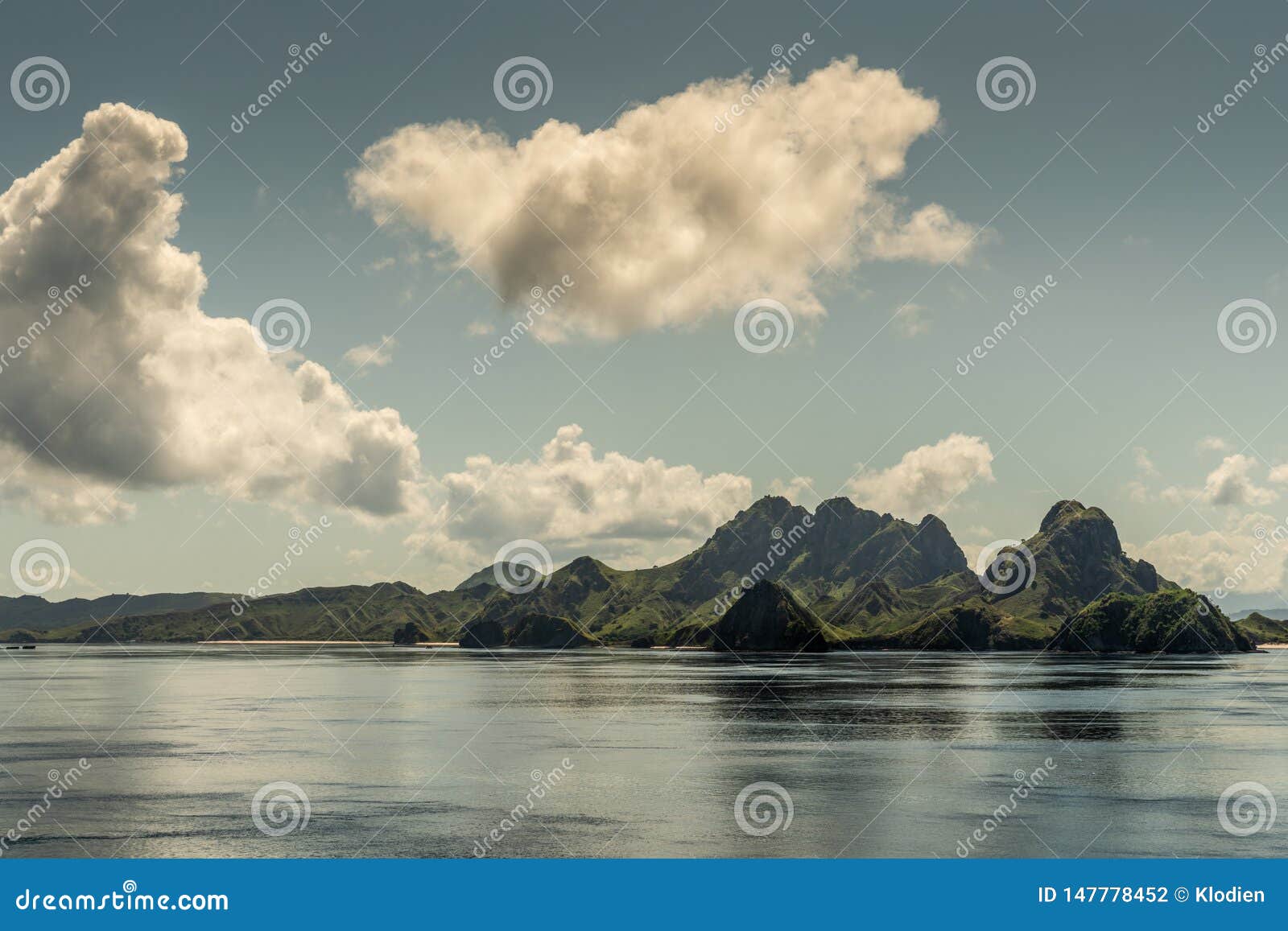 beaches and hill peaks on rinca island westside coast, indonesia