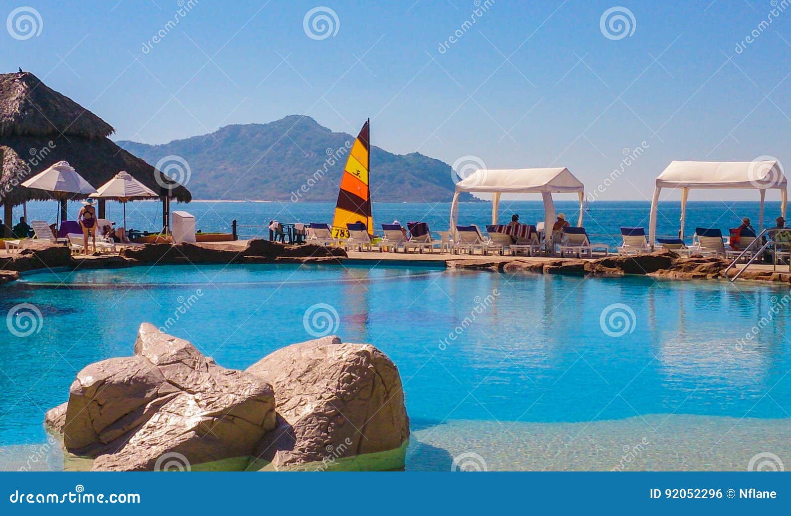 beachside pool overlooking venados island on the pacific ocean in mazatlan, sinaloa, mexico.