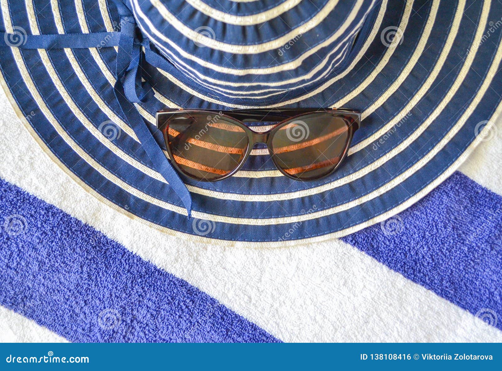 Beachware and Accesories on Blue-white Towel Background. Stock Photo ...