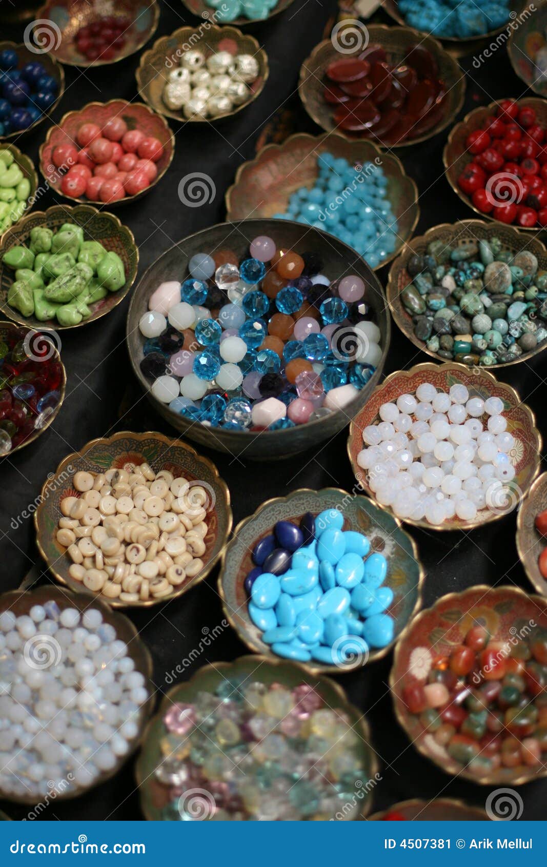Beads in bowls stock image. Image of green, clear, sheiny 4507381