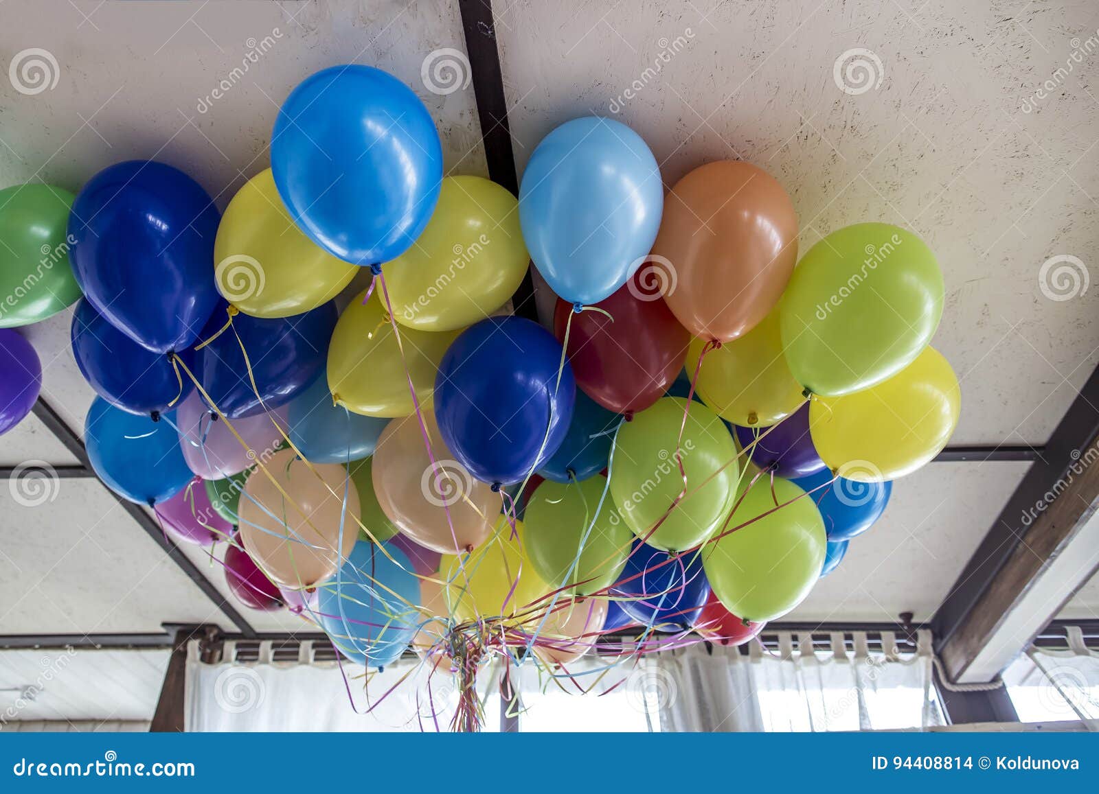 Beam Of Bright Beautiful Balloons On The Ceiling Stock