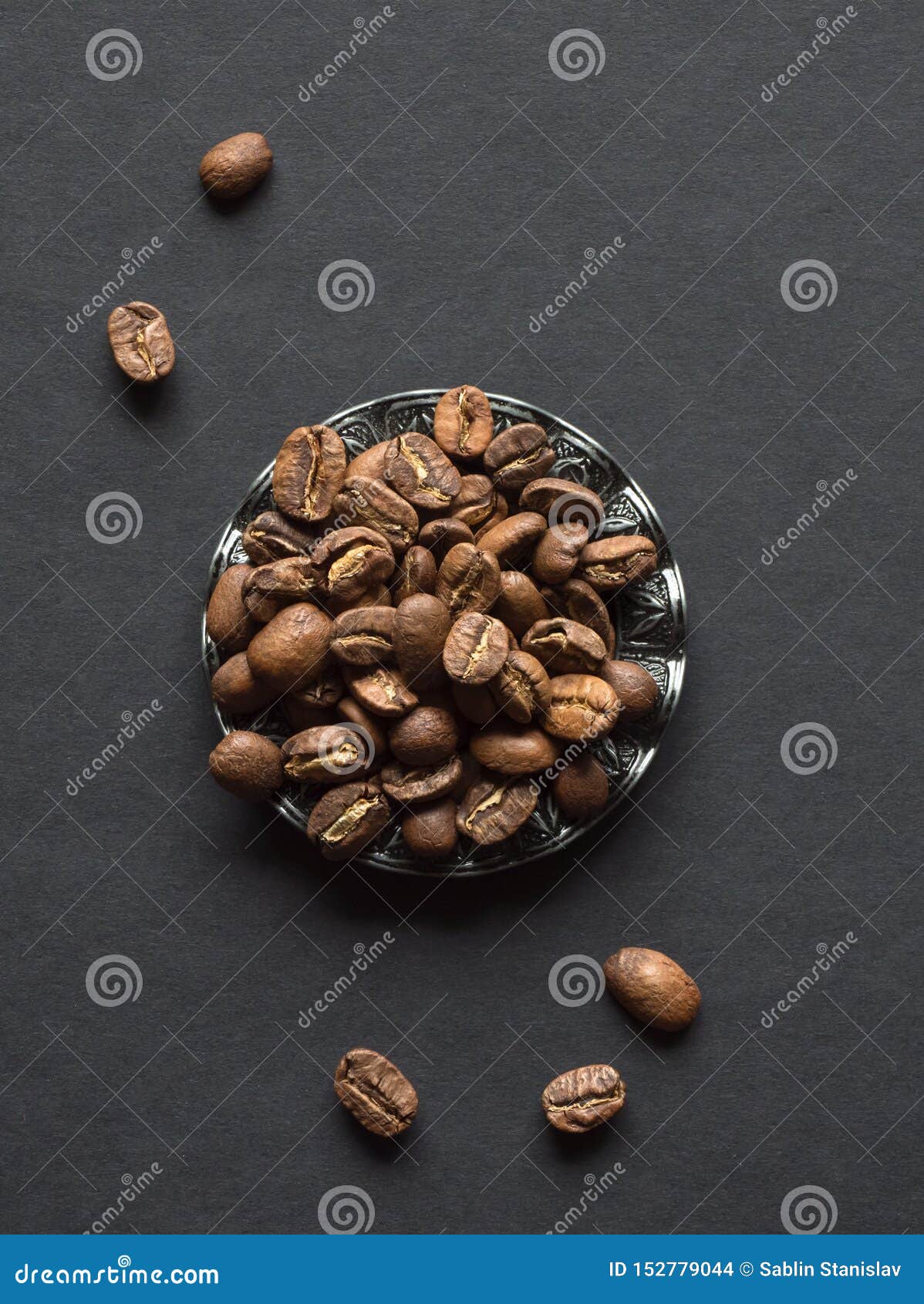 Beans of Roasted Coffee in a Vintage Plate on a Black Table Stock Photo ...