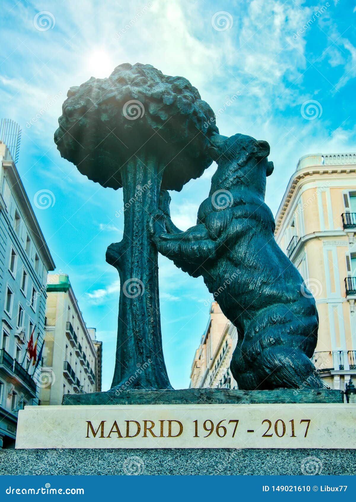 the bear  of madrid. statue of the bear and the strawberry tree oso y el madrono in puerta del sol square in madrid spain