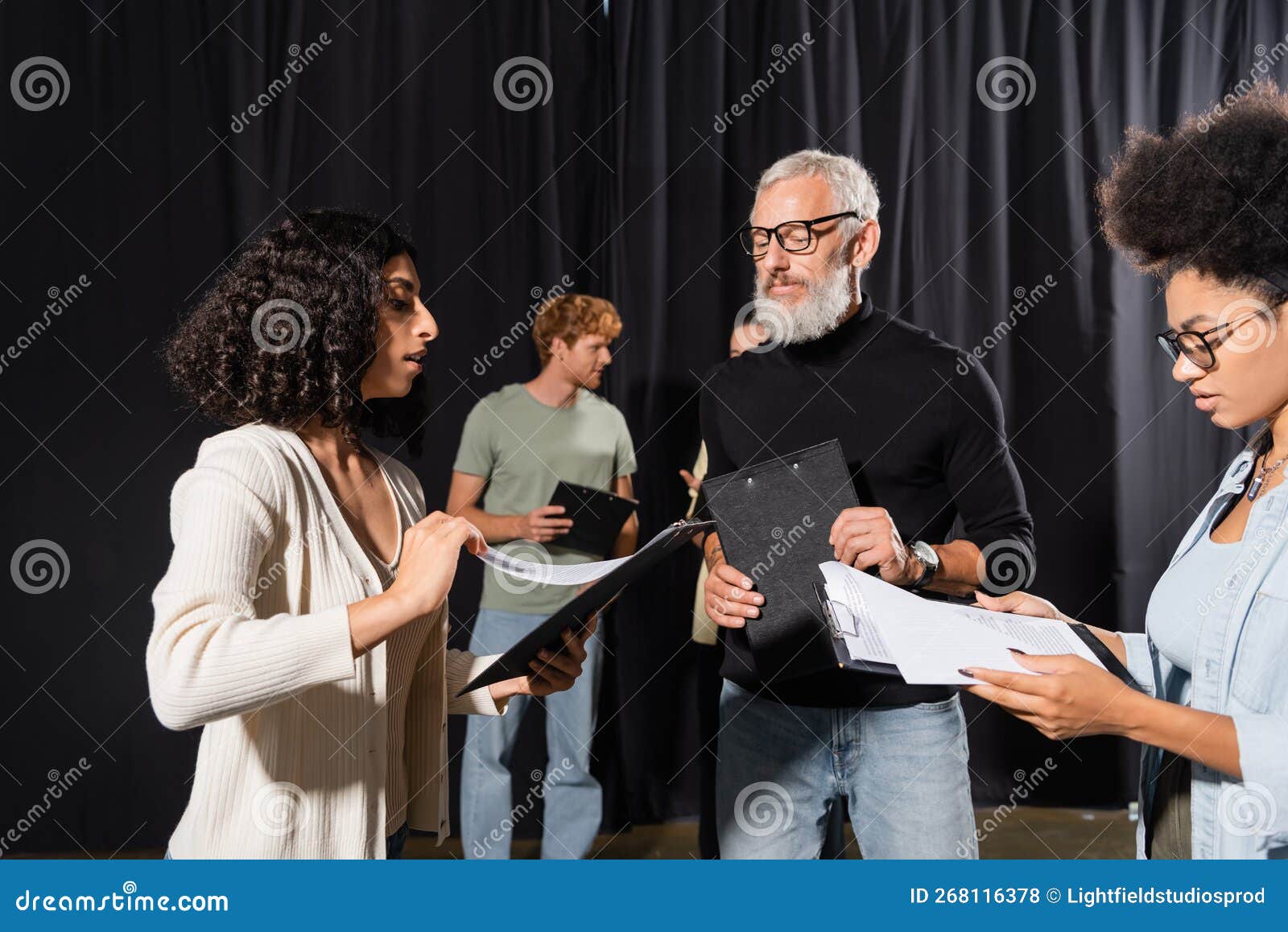 bearded acting skills teacher looking at