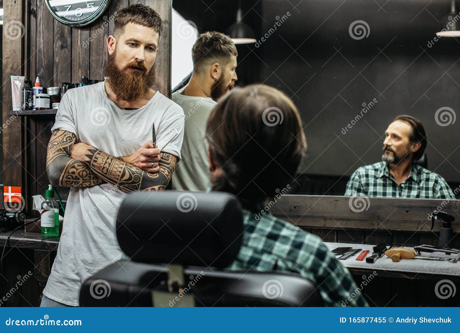 Dark Haired Man Looking at the Barber while Sitting in Armchair Stock ...