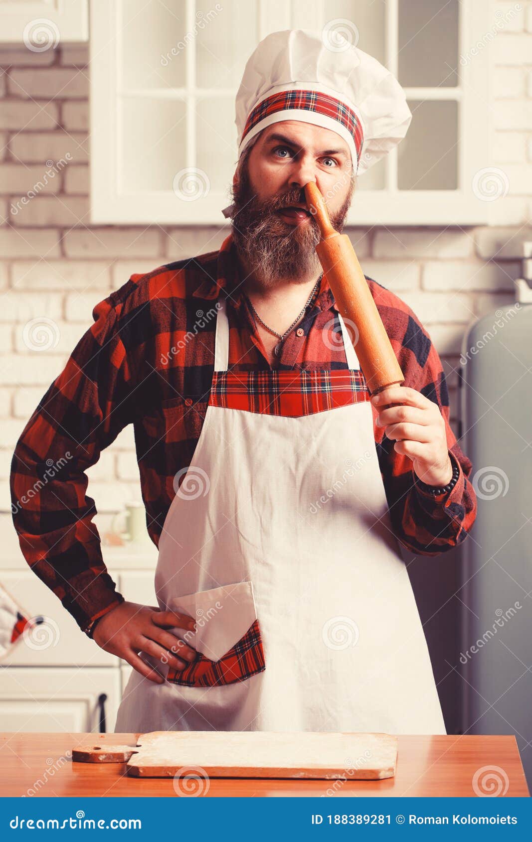 Bearded Chef Sticks a Rolling Pin in His Nose. Crazy Chef in a ...