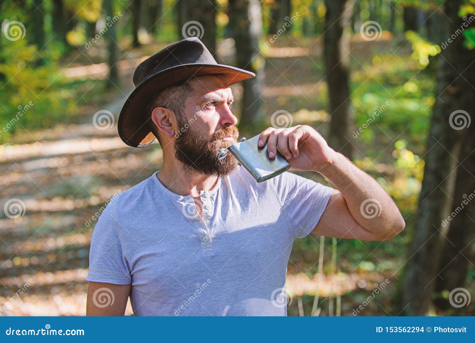 Bearded Man in Cowboy Hat Walk in Park Outdoor. Man Hipster Relax in ...
