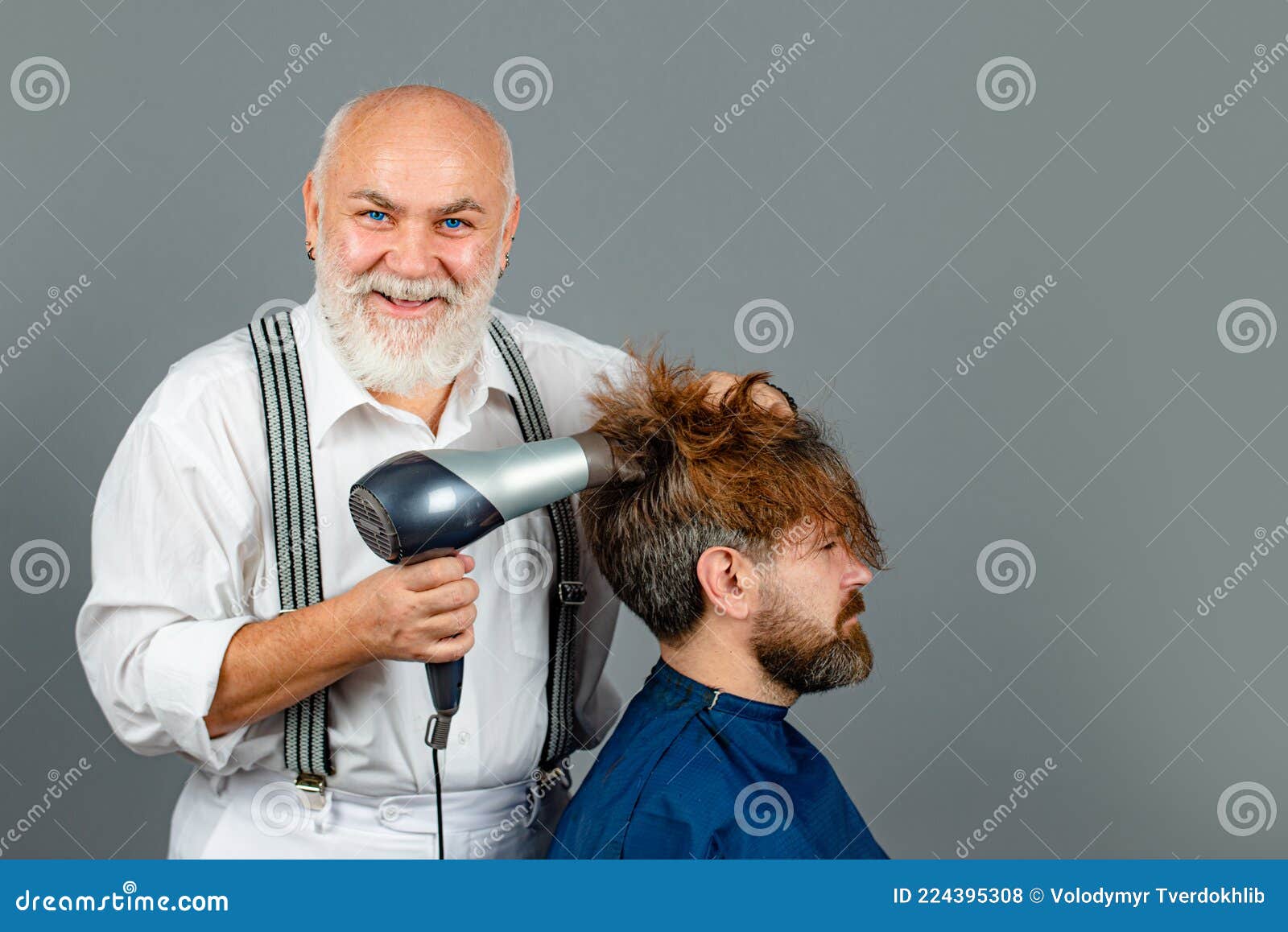 Bearded Man Getting Hairstyle by Hairdresser with Hair Dryer at Barbershop.  Happy Hairdresser Holding a Blow Dryer. Stock Photo - Image of hairdress,  hairdresser: 224395308