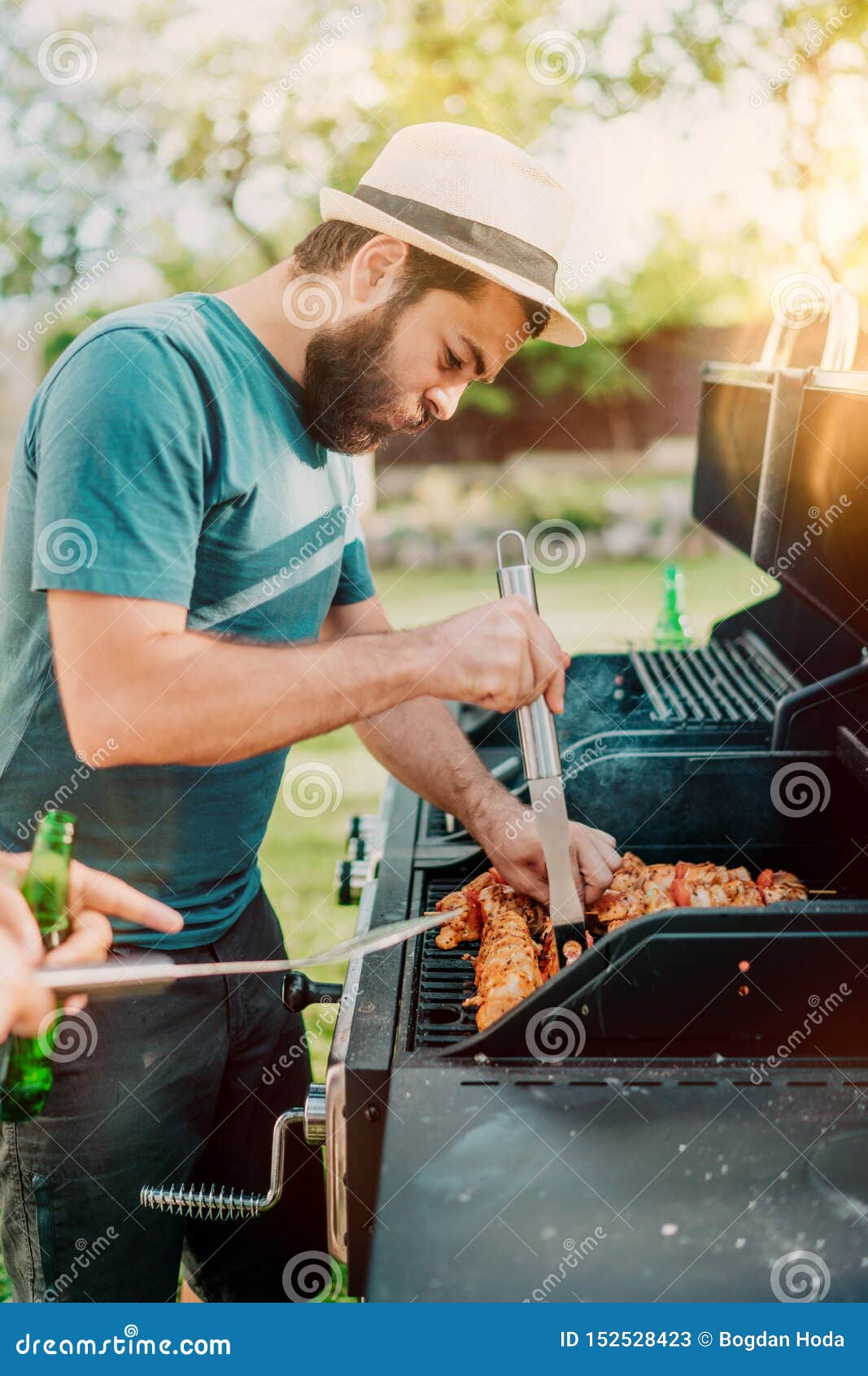 Bearded Man Grilling Chicken At Barbecue Party Stock Image Image Of Grill Carefree 152528423 