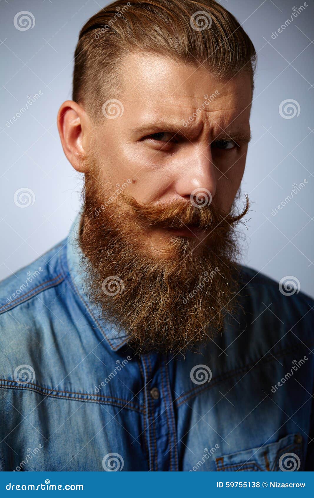 Bearded Man. Handsome Man With A Beard And Twirled 
