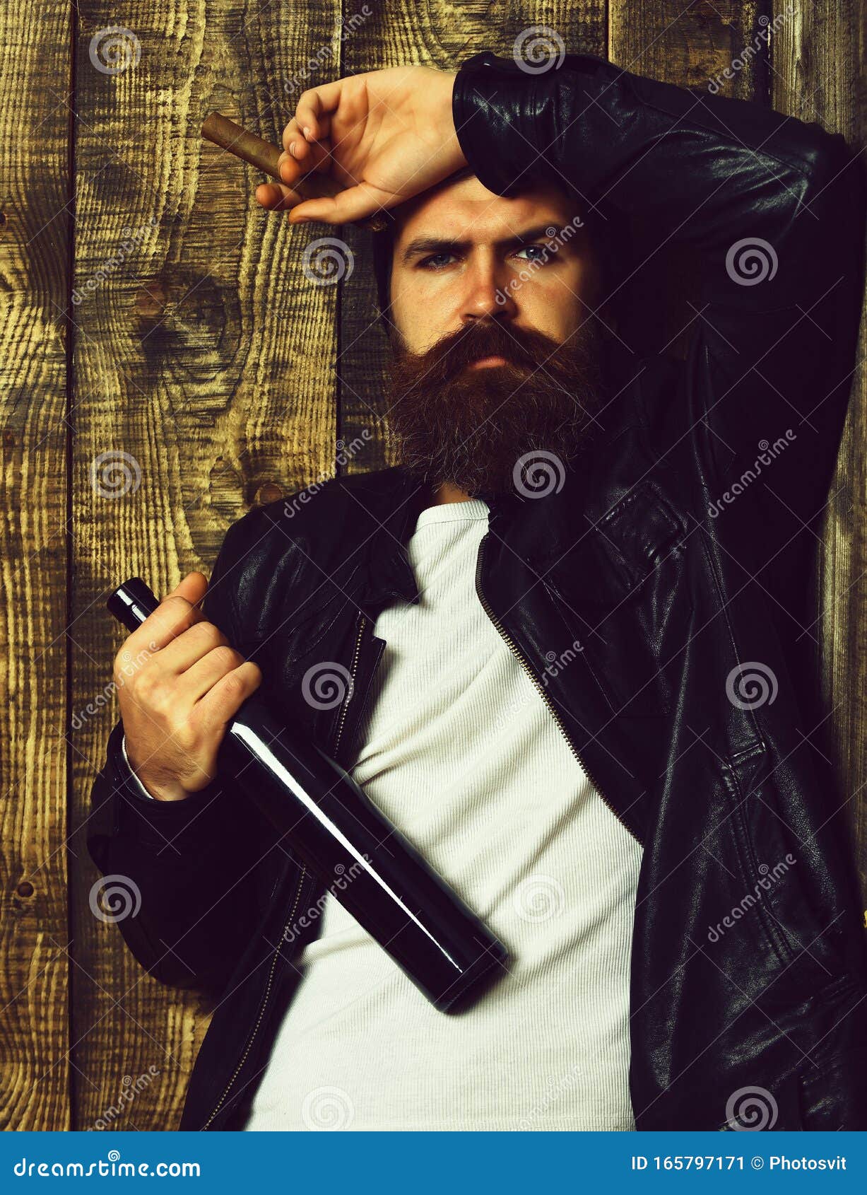 Bearded Brutal Caucasian Hipster Holding Bottle and Smoking Cigar Stock ...