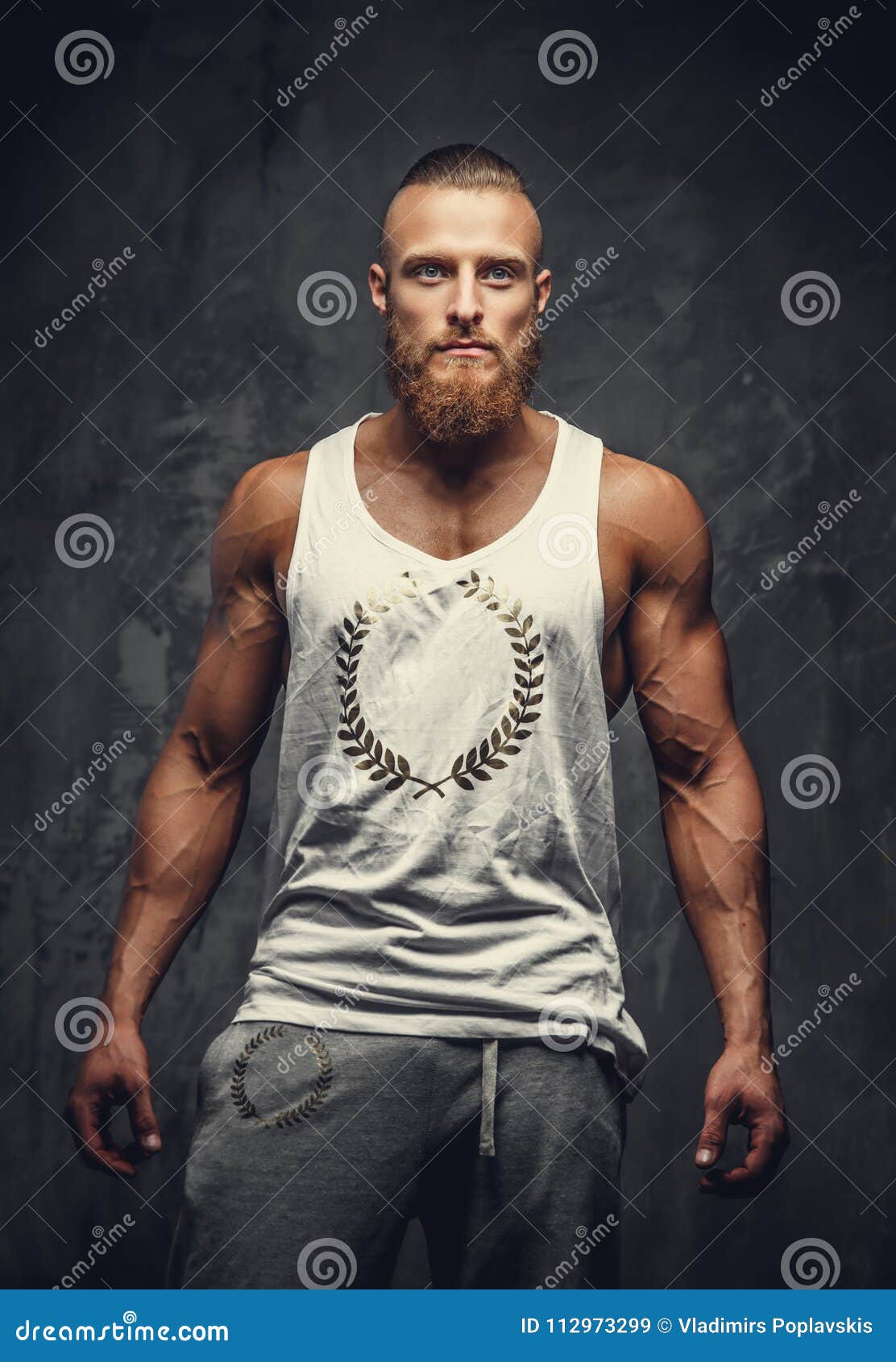 Bearded man in a t shirt. stock image. Image of bodybuilding 112973299