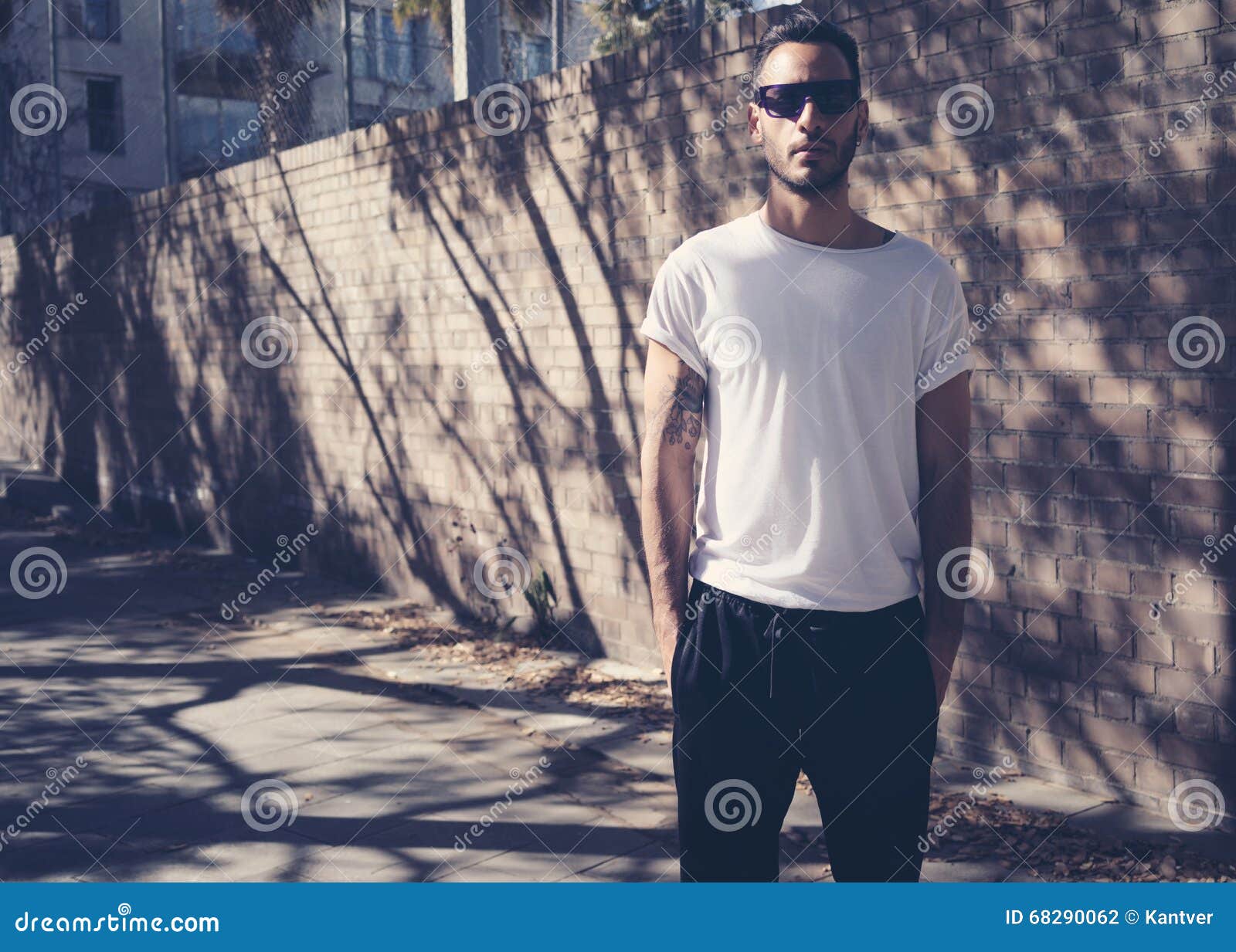 Bearded Man With Tattoo Wearing Blank White Tshirt And Black