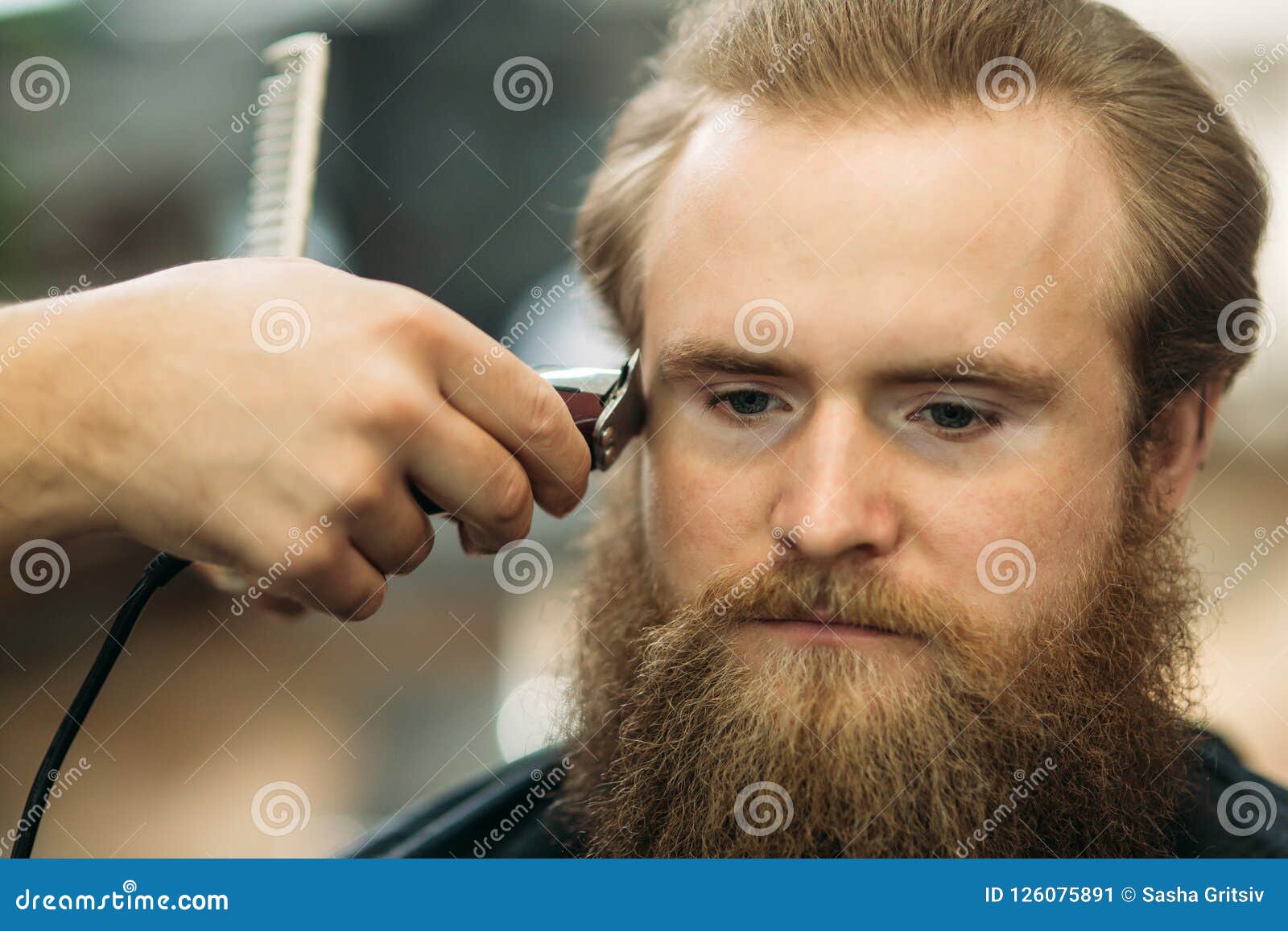 Bearded Man Having a Haircut with a Hair Clippers. Closeup View with  Shallow Depth of Field Stock Image - Image of design, modern: 126075891
