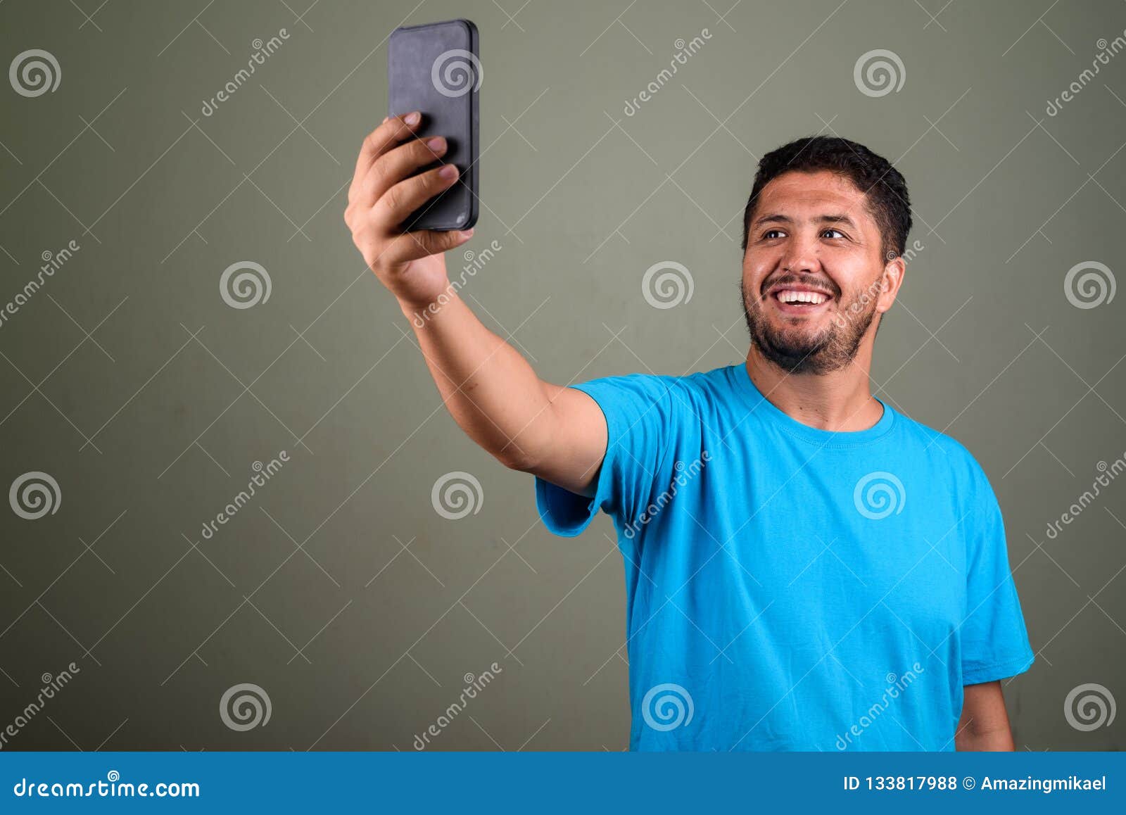 Bearded Persian Man Wearing Blue Shirt Against Colored Backgroun Stock ...