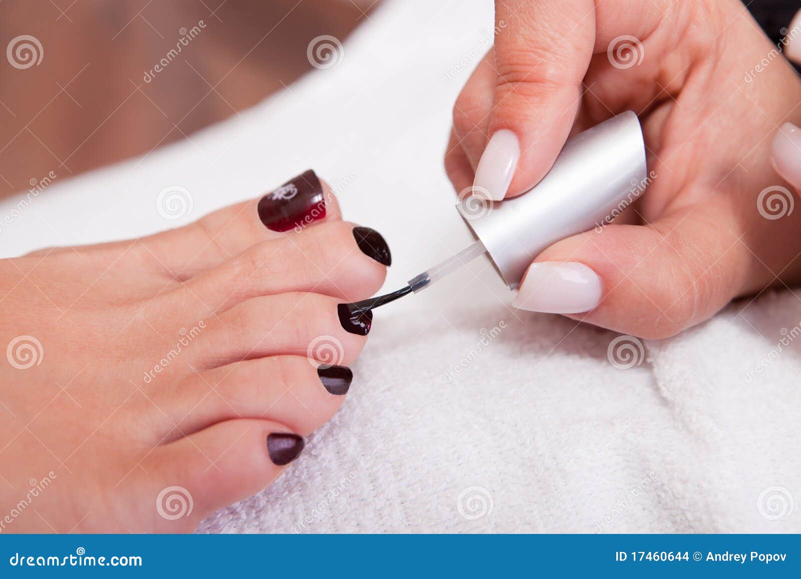 beautician working on toenails