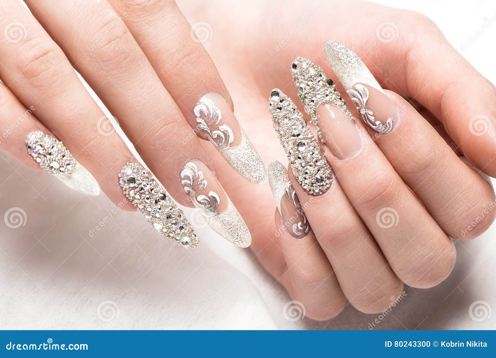 beautifil wedding manicure for the bride in gentle tones with rhinestone. nail . close-up