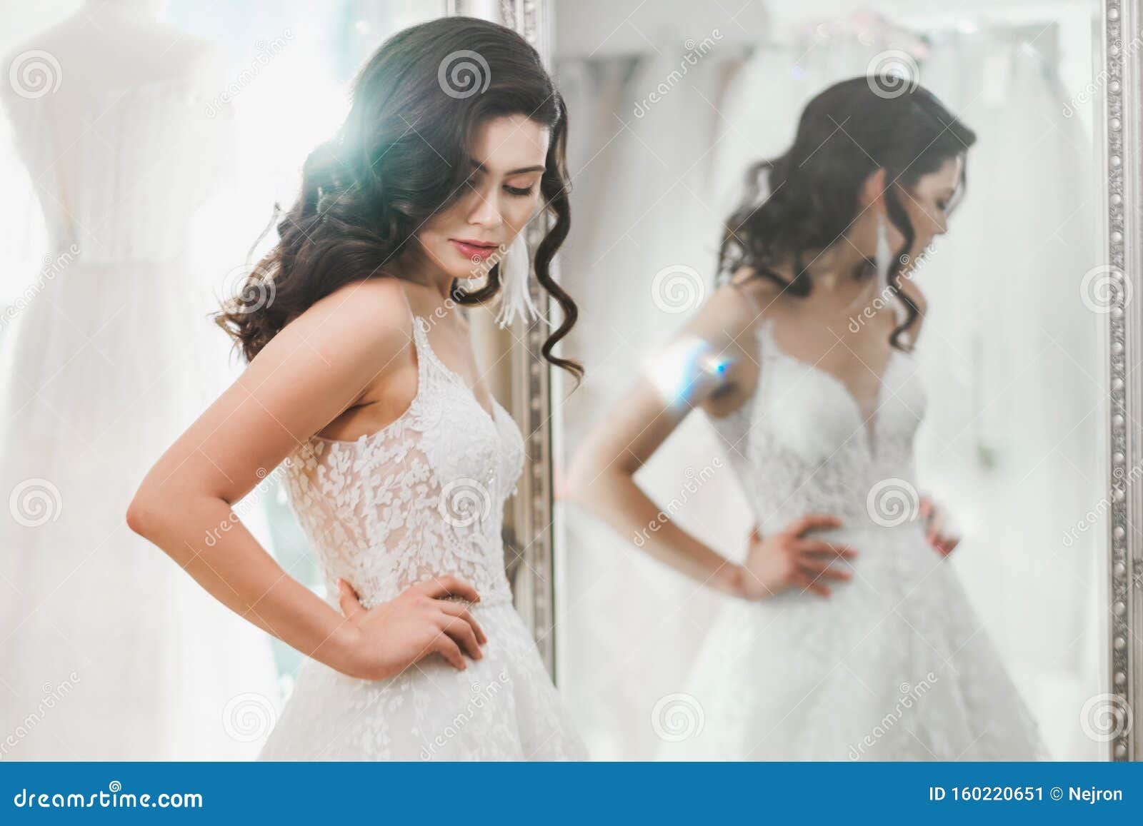 Beautifu Bride Choosing Wedding Dress in a Wedding Salon Stock Image ...