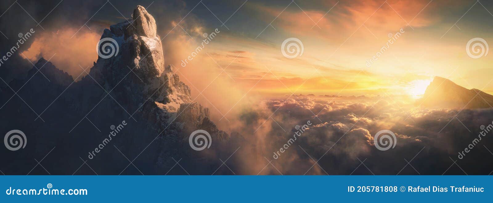 beautiful aerial landscape of mountain peak at sunset above the clouds - panoramic